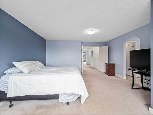 920 Prairie Springs Drive Sw, Airdrie, AB - Indoor Photo Showing Bedroom