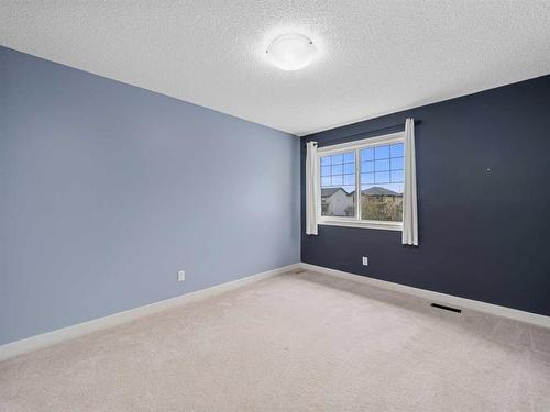 920 Prairie Springs Drive Sw, Airdrie, AB - Indoor Photo Showing Other Room