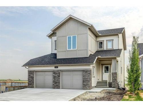 214 Vista Road, Crossfield, AB - Outdoor With Facade