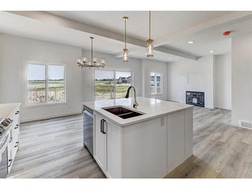 214 Vista Road, Crossfield, AB - Indoor Photo Showing Kitchen With Fireplace With Double Sink