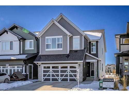 15 Midgrove Drive Sw, Airdrie, AB - Outdoor With Facade