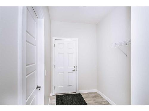 15 Midgrove Drive Sw, Airdrie, AB - Indoor Photo Showing Other Room