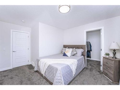 15 Midgrove Drive Sw, Airdrie, AB - Indoor Photo Showing Bedroom
