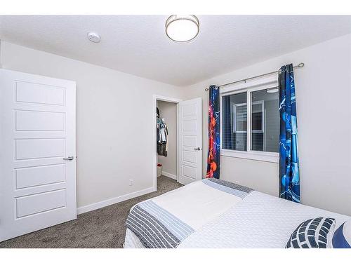 15 Midgrove Drive Sw, Airdrie, AB - Indoor Photo Showing Bedroom