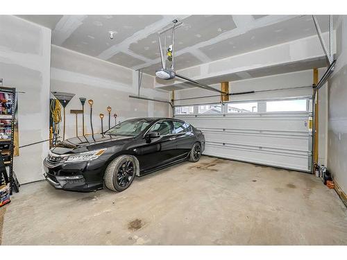 15 Midgrove Drive Sw, Airdrie, AB - Indoor Photo Showing Garage