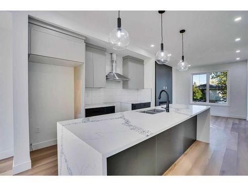 1802 19 Avenue Nw, Calgary, AB - Indoor Photo Showing Kitchen With Double Sink With Upgraded Kitchen