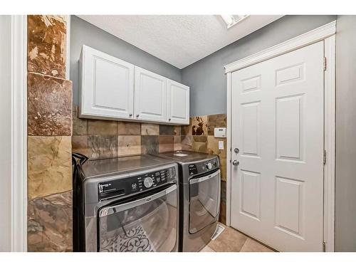 13 Everwillow Boulevard Sw, Calgary, AB - Indoor Photo Showing Laundry Room