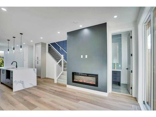 2007 17 Street Nw, Calgary, AB - Indoor Photo Showing Living Room With Fireplace