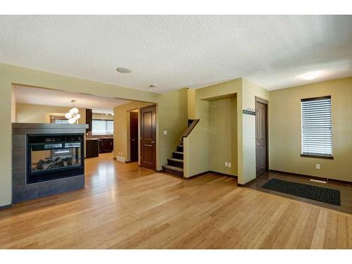 167 89 Street Sw, Calgary, AB - Indoor With Fireplace