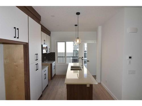 355 Sage Hill Rise Nw, Calgary, AB - Indoor Photo Showing Kitchen With Double Sink