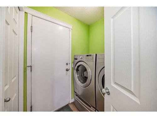 94 Citadel Mesa Close Nw, Calgary, AB - Indoor Photo Showing Laundry Room
