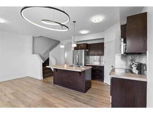 38 Sage Hill Common Nw, Calgary, AB - Indoor Photo Showing Kitchen With Stainless Steel Kitchen With Upgraded Kitchen