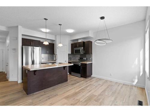 38 Sage Hill Common Nw, Calgary, AB - Indoor Photo Showing Kitchen With Stainless Steel Kitchen With Upgraded Kitchen