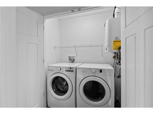38 Sage Hill Common Nw, Calgary, AB - Indoor Photo Showing Laundry Room
