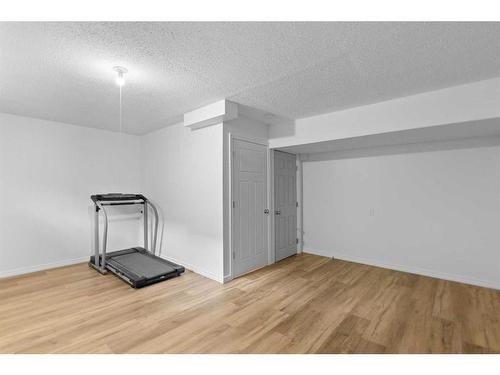 38 Sage Hill Common Nw, Calgary, AB - Indoor Photo Showing Gym Room