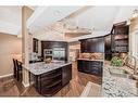 271214 Range Road 13 Nw, Airdrie, AB  - Indoor Photo Showing Kitchen With Double Sink With Upgraded Kitchen 