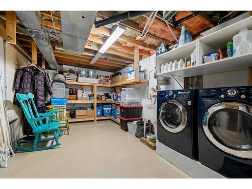 112 Woodside Bay Sw, Calgary, AB - Indoor Photo Showing Laundry Room