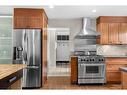 112 Woodside Bay Sw, Calgary, AB  - Indoor Photo Showing Kitchen With Stainless Steel Kitchen 