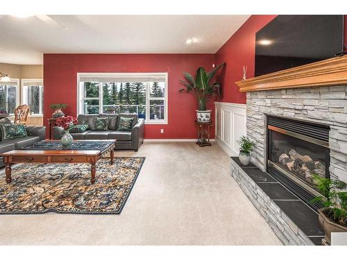 24 Discovery Ridge Rise Sw, Calgary, AB - Indoor Photo Showing Living Room With Fireplace