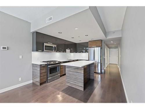 111-235 9A Street Nw, Calgary, AB - Indoor Photo Showing Kitchen With Upgraded Kitchen