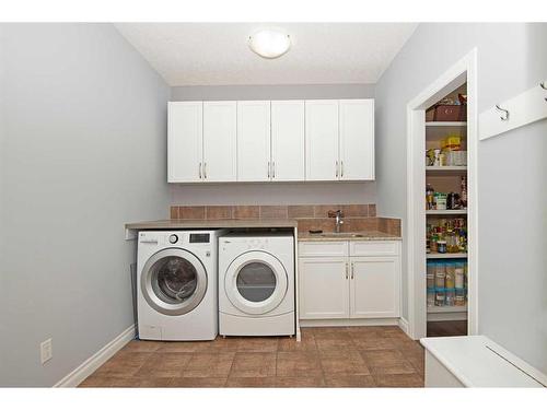 148 Sherwood Rise Nw, Calgary, AB - Indoor Photo Showing Laundry Room