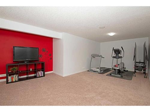 148 Sherwood Rise Nw, Calgary, AB - Indoor Photo Showing Gym Room