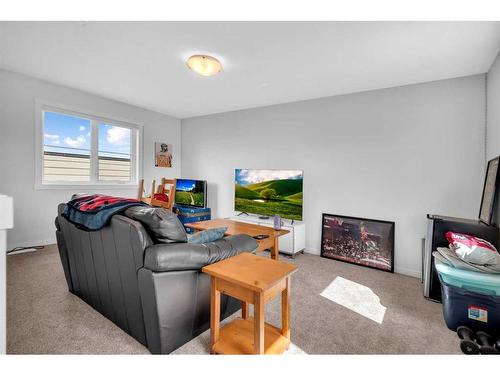 402-260 Rowley Way Nw, Calgary, AB - Indoor Photo Showing Living Room
