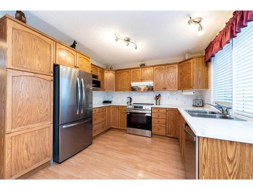 14232 Evergreen Street Sw, Calgary, AB - Indoor Photo Showing Kitchen With Stainless Steel Kitchen With Double Sink