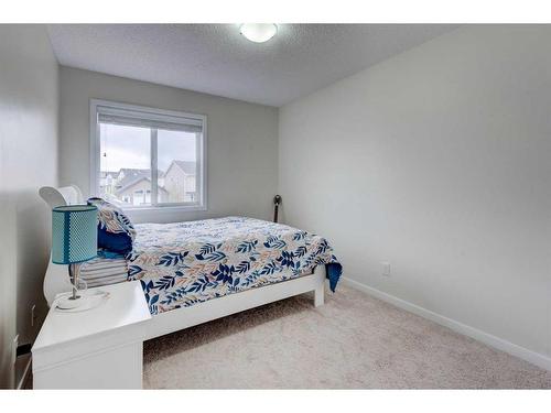 40 Cranford Park Se, Calgary, AB - Indoor Photo Showing Bedroom