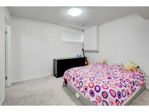 40 Cranford Park Se, Calgary, AB - Indoor Photo Showing Bedroom