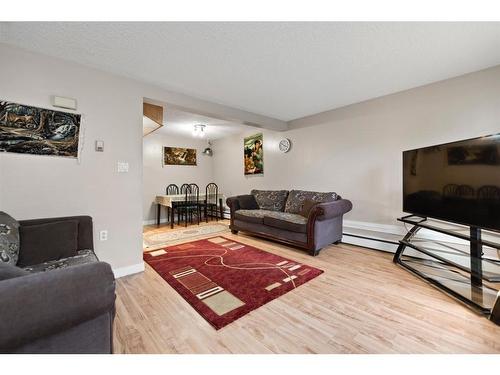 112-3809 45 Street Sw, Calgary, AB - Indoor Photo Showing Living Room