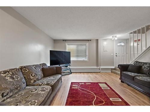 112-3809 45 Street Sw, Calgary, AB - Indoor Photo Showing Living Room