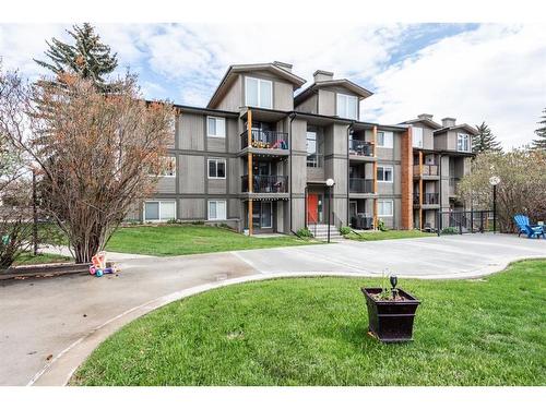 624-6400 Coach Hill Road Sw, Calgary, AB - Outdoor With Balcony With Facade