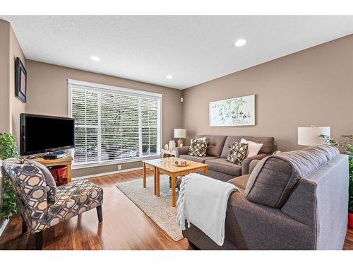 161 Tuscany Springs Way Nw, Calgary, AB - Indoor Photo Showing Living Room