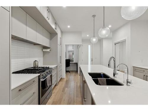 203-830 78 Street Sw, Calgary, AB - Indoor Photo Showing Kitchen With Double Sink With Upgraded Kitchen