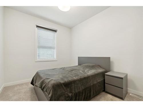 203-830 78 Street Sw, Calgary, AB - Indoor Photo Showing Bedroom