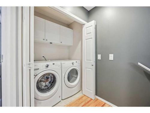 8 Country Village Landing Ne, Calgary, AB - Indoor Photo Showing Laundry Room