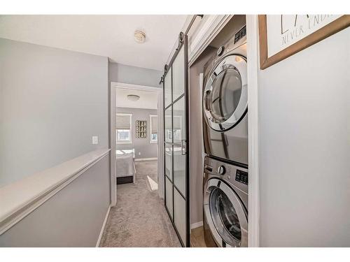 1049 Kingston Crescent Se, Airdrie, AB - Indoor Photo Showing Laundry Room