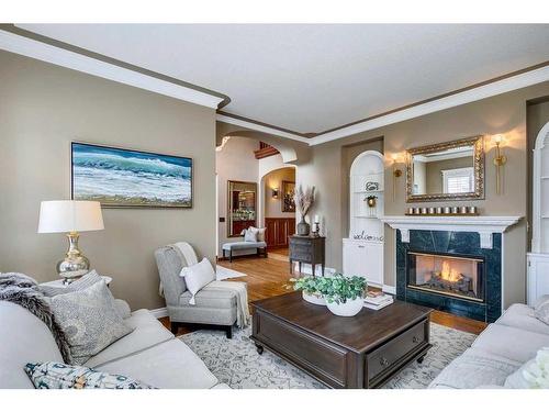 214 Sienna Hills Terrace Sw, Calgary, AB - Indoor Photo Showing Living Room With Fireplace