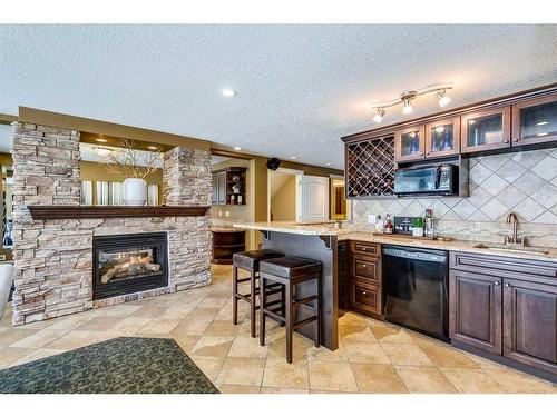 214 Sienna Hills Terrace Sw, Calgary, AB - Indoor With Fireplace