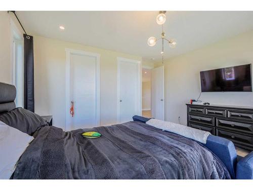 41 Farries Drive Se, Airdrie, AB - Indoor Photo Showing Bedroom