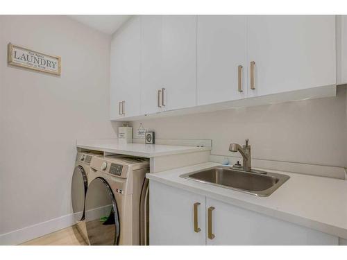 41 Farries Drive Se, Airdrie, AB - Indoor Photo Showing Laundry Room