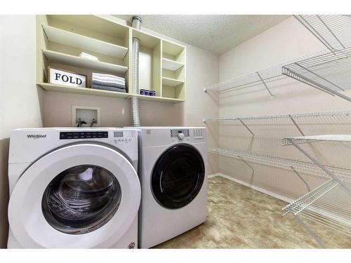 14-635 Marsh Road Ne, Calgary, AB - Indoor Photo Showing Laundry Room