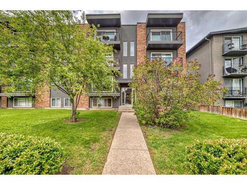 203-1817 16 Street Sw, Calgary, AB - Outdoor With Balcony With Facade