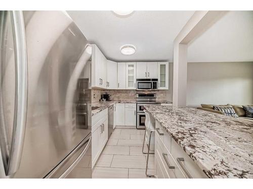 203-1817 16 Street Sw, Calgary, AB - Indoor Photo Showing Kitchen With Stainless Steel Kitchen With Upgraded Kitchen
