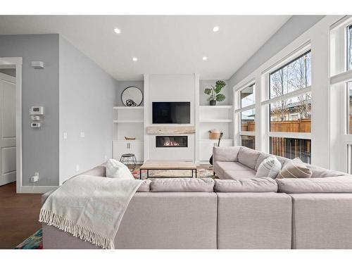 3013 34 Street Sw, Calgary, AB - Indoor Photo Showing Living Room With Fireplace