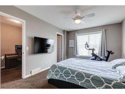 3138 New Brighton Gardens Se, Calgary, AB - Indoor Photo Showing Bedroom