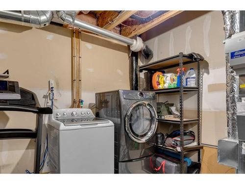 3138 New Brighton Gardens Se, Calgary, AB - Indoor Photo Showing Laundry Room