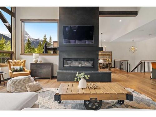 108 River'S Bend Way, Dead Man'S Flats, AB - Indoor Photo Showing Living Room With Fireplace