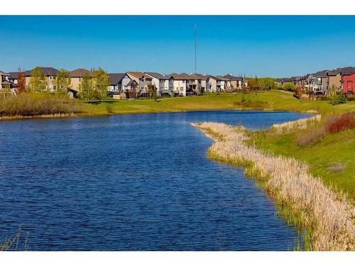 47 Cougarstone Common Sw, Calgary, AB - Outdoor With Body Of Water With View
